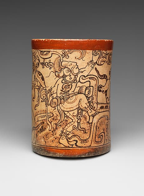 Painted Maya ceramic vessel with mythological figures arranged around its curved surface.